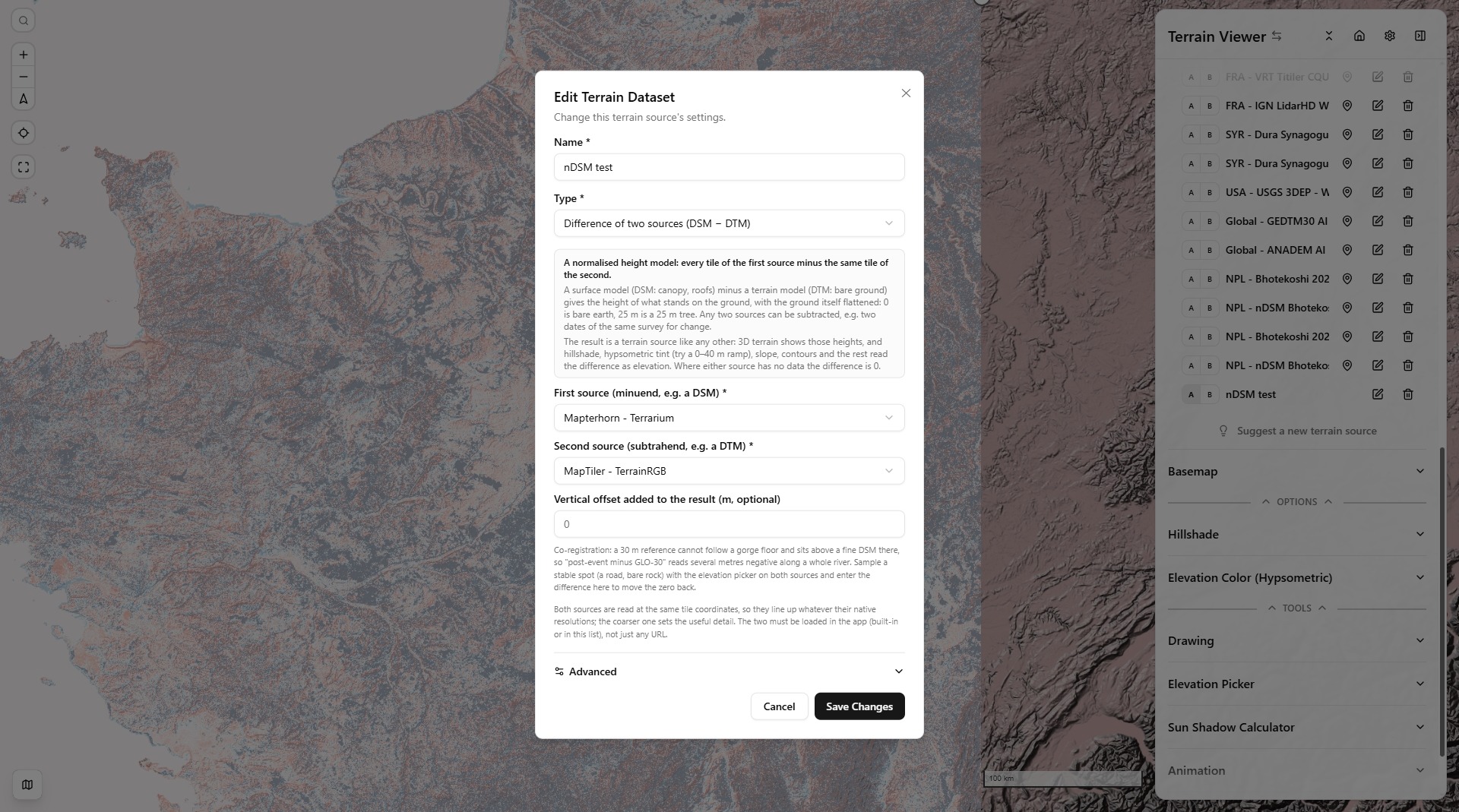 The Edit Terrain Dataset dialog for a difference source: the two operand pickers, the vertical offset field and the explanation panel, over a hypsometric difference map