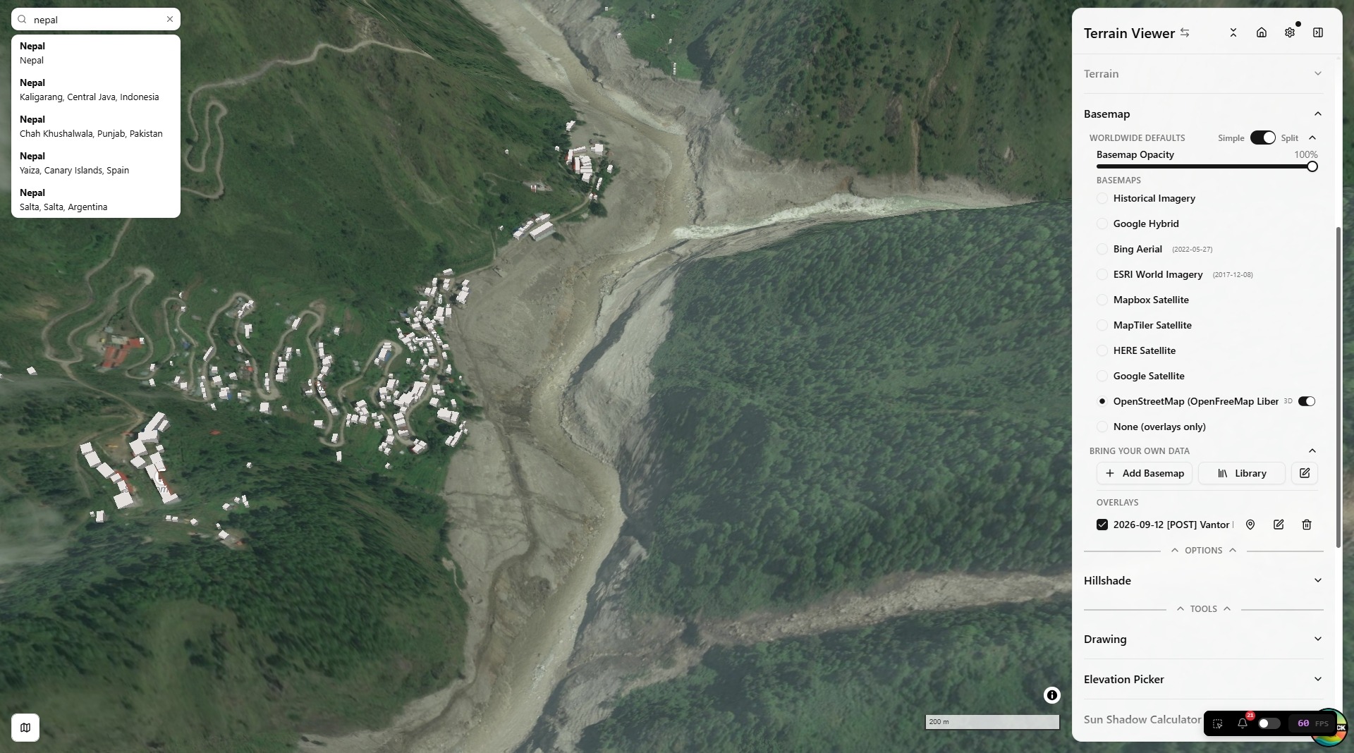 OSM 3D buildings from OpenFreeMap Liberty over a Vantor post-event overlay